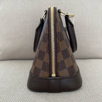 Louis Vuitton Alma Bb Leather Handbag - All About Eg