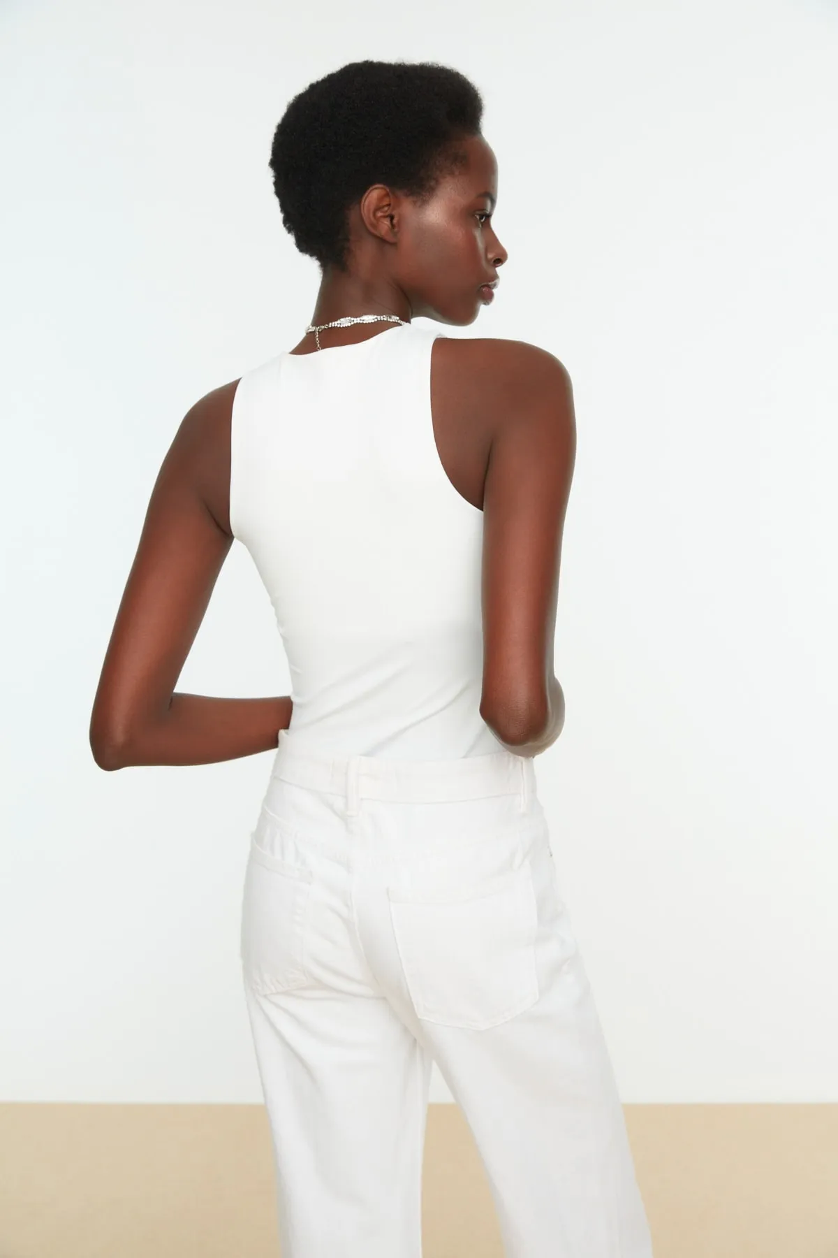 White Halter Neck Body Fitting Flexible Snap Knitted Body - All About Eg