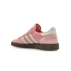 All About Pink Adidas sneaker with three white stripes