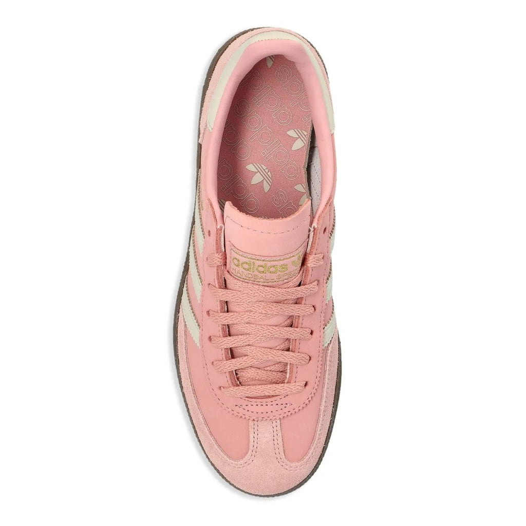 All About Pink Adidas sneaker with three white stripes