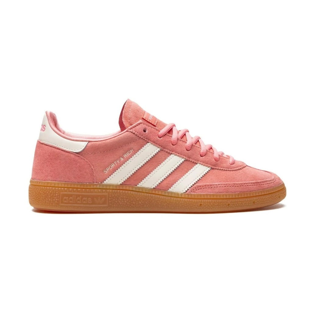 All About Pink Adidas sneaker with white stripes