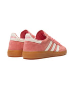 All About Pink Adidas sneaker with white stripes