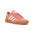 All About Pink Adidas sneaker with white stripes