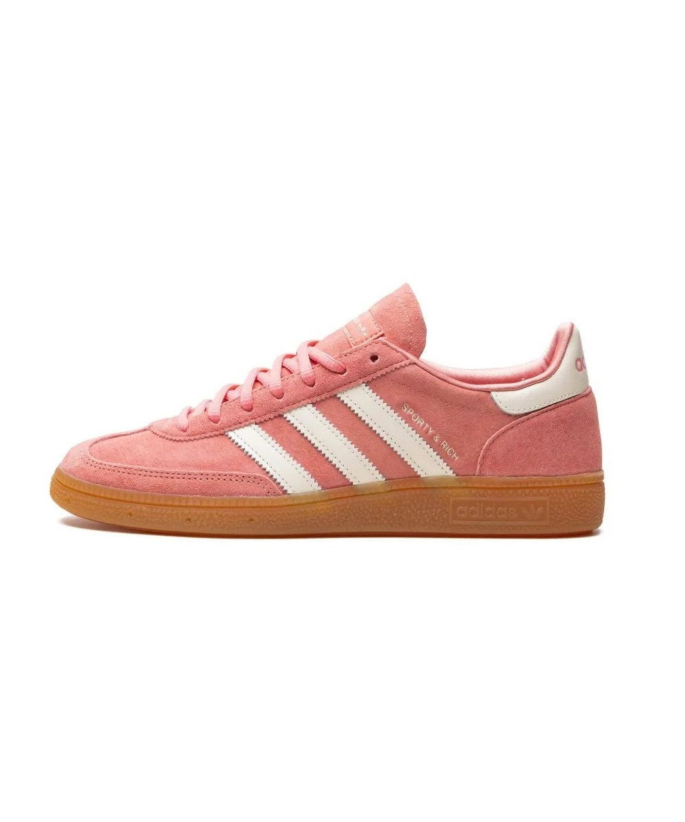 All About Pink Adidas sneaker with white stripes