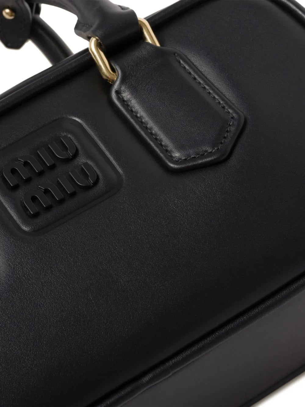 Miu Miu Small bag with brand logo brooch