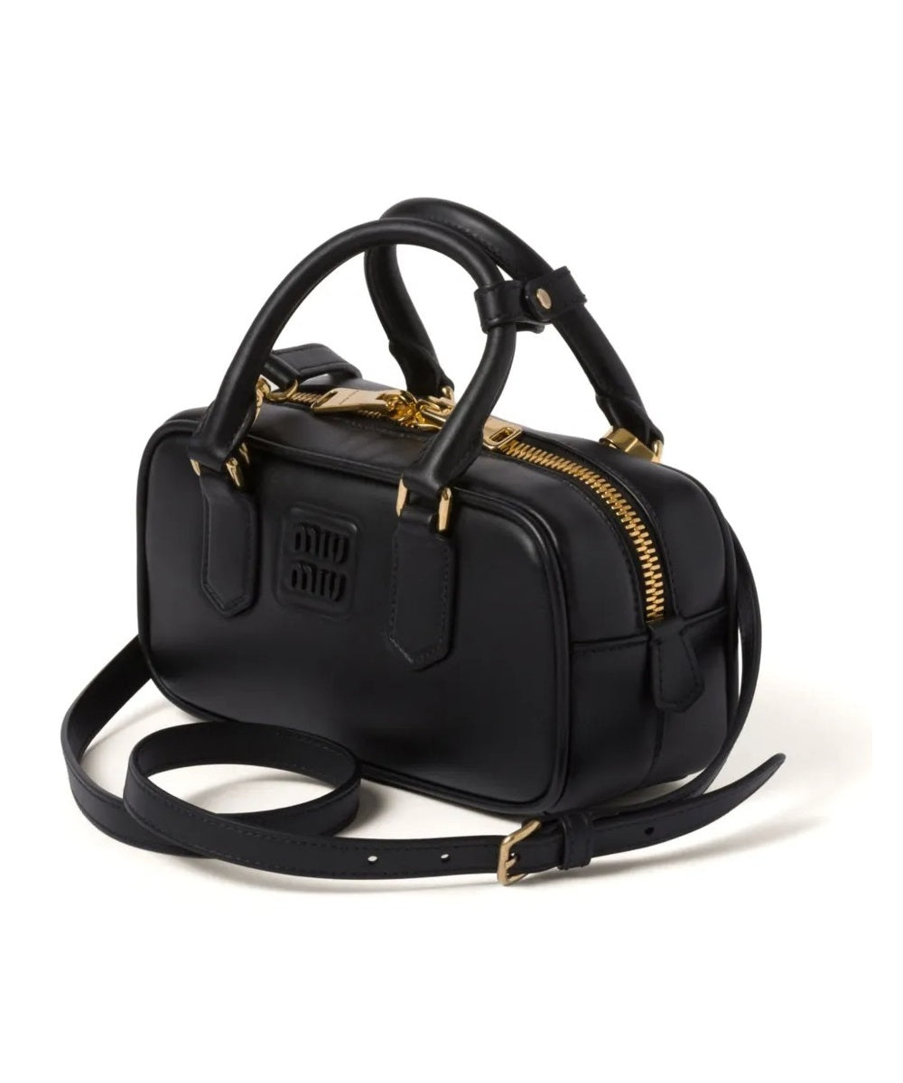 Miu Miu Small bag with brand logo brooch