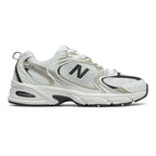White athletic shoe with black accents on a white background