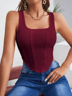 Women's Sleeveless Solid Color Asymmetrical Hem Shirt