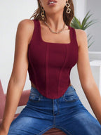 Women's Sleeveless Solid Color Asymmetrical Hem Shirt